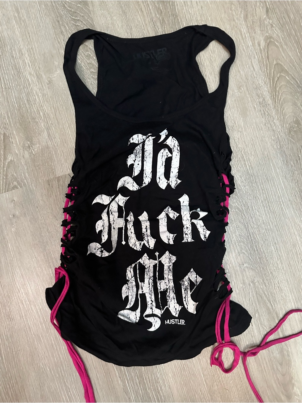 Hustler Hollywood “I’d f**k me.” Black tank top with Pink Lace-Up Sides.